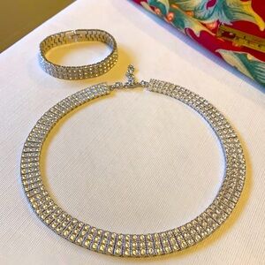 Silver rhinestone 15 inch necklace and 7 1/2 inch bracelet. Worn once.